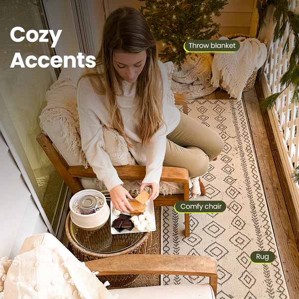 Young woman sitting in small balcony making smores.