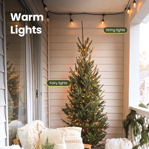 Christmas decorations in small apartment balcony.